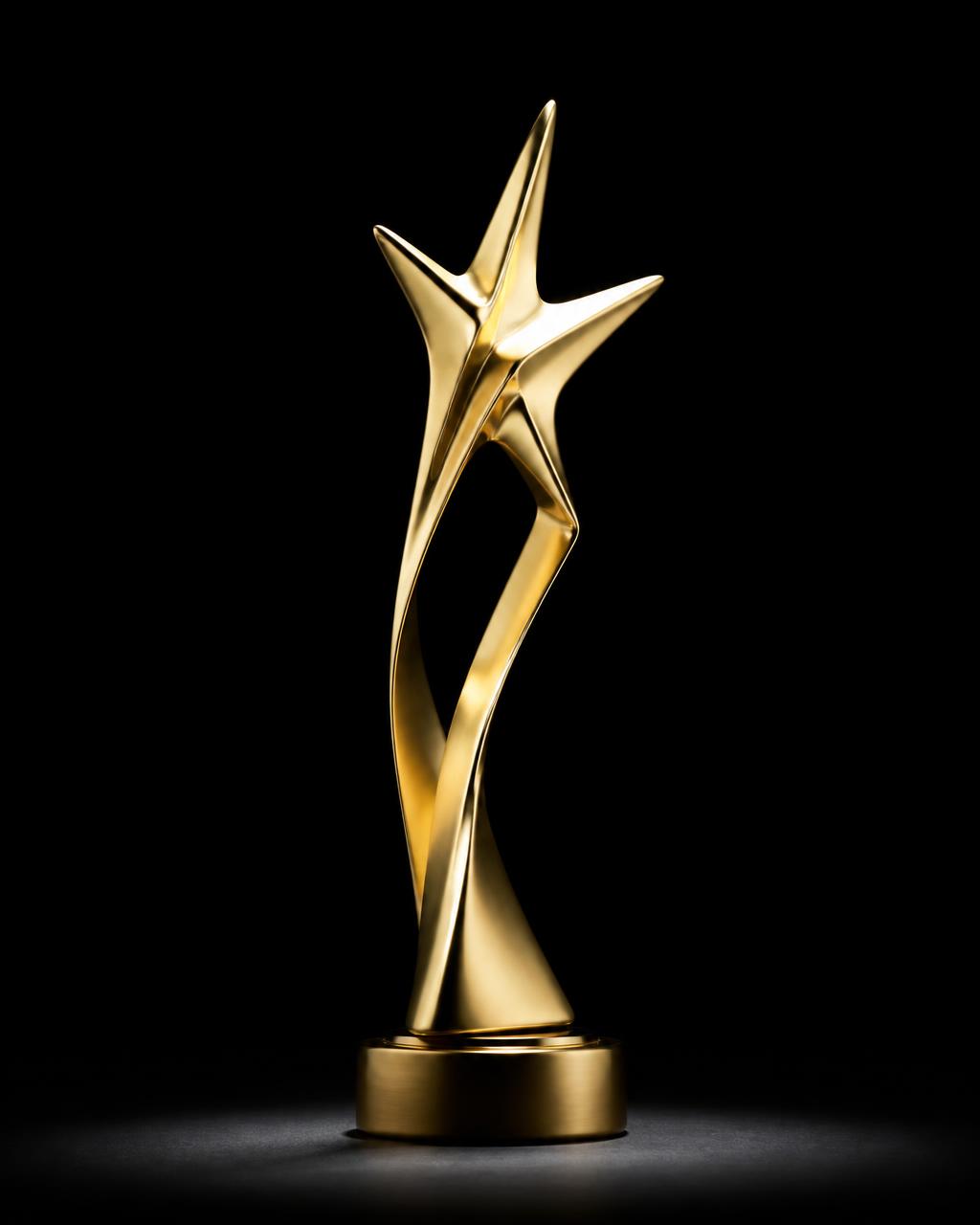 The Latina Awards trophy, cast in polished brass